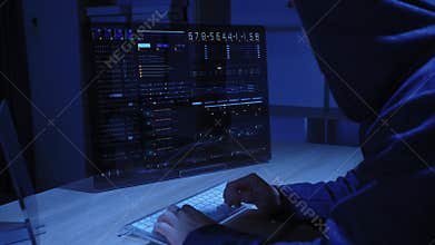 Access Granted: Hacker in Hoodie Launches Virus, Program Code Running