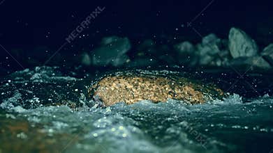Slow motion ripple waves on dark water river.Super slow motion detail 4k video.Crystal clear spring river.Amazing