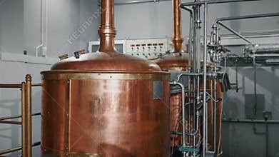Production line with copper tanks at food and drink facility
