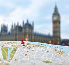 Travel destination London map push pin blur