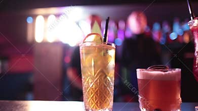 Ready-made drinks are on the bar ready to be consumed.