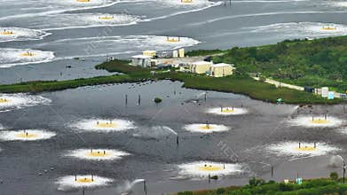 Aeration pond at cellulose and paper plant in Brunswick GA. Poisonous influence of manufacturing industry on environment