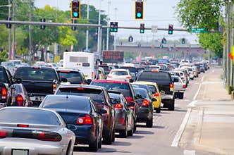 Traffic lights with rush hour traffic jam