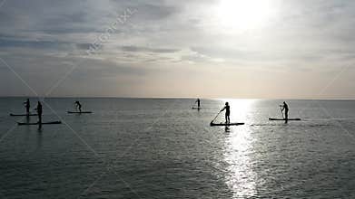 Stand-up paddle boarding lovers enjoy adventure