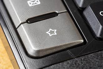 A simple star symbol icon button, favorite bookmark key, liking, adding to favorites, bookmarking a webpage business website SEO