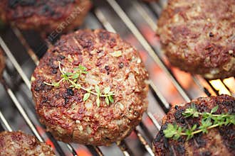 Food meat - beef burgers on bbq barbecue grill