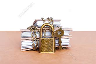 Small books secured with chain and padlock