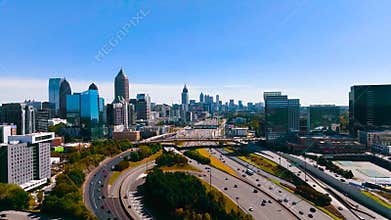 Drone video Atlanta city skyline of Downtown Atlanta Georgia shot in 4K. Over highway 75 with traffic.