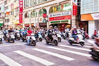 Scooter Riders During Morning Rush Hour in Taipei, Taiwan