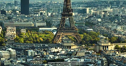 France Paris drone shot, aerial view flying over Trocadero looking at Tour Eiffel cloudy. Cityscape aerial view