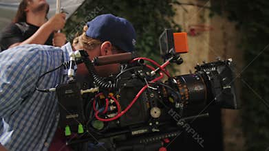 Filming crew prepares yard for filming scene for movie