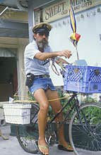 Male bicyclist resting