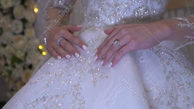 Bridal Woman Showcasing Her Wedding Dress