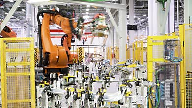 Berlin - Germany, december 6, 2022: Modern factory, timelapse effect. Scene. Automated production line with robotic arms
