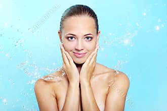 Beautiful girl and stream of water