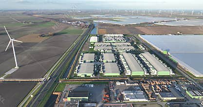 Large scale computing infrastructure, datacenter aerial drone overhead view. Telecommunication server infrastructure.