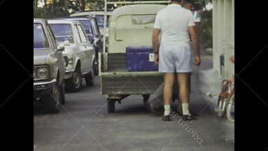 Italy 1975, Industrious Workers of the 80s: Loading Goods on Ape Scooters