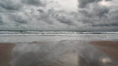 Storm clouds brewing over Cornish beach