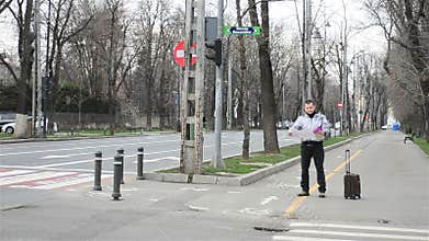 Confused man looking at the map