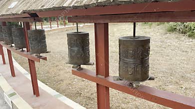 prayer wheels spinning buddhism stupa