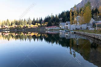 Scenic lake view with autumn colors and reflections at Lower Kachura Lake, also known as Shangrila Lake, is a lake located near