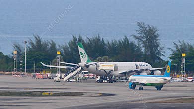 Runway near coastline scenery