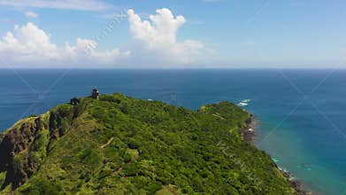 Lighthouse on a tropical island.