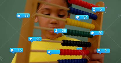 Boy sliding abacus beads generating animated social media icons tracking engagement growth