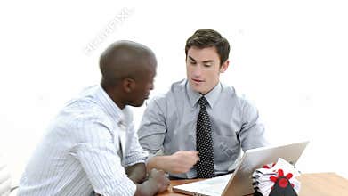 Panorama of two businessmen working together with a laptop