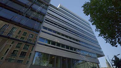 Commercial company building with glass facade in downtown of Hamburg Germany