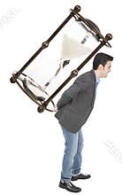 Businessman carrying a hourglas