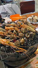 seafood , Seafood Buffet with Fresh Shrimp Crab Shellfish Grilled BBQ and Spicy Seafood Sauce.