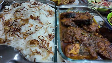 Delicious homemade chicken curry with rice served on table