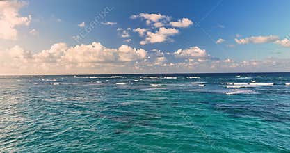 Flying over Blue sea with waves and sky with clouds nature panorama, travel with yacht boat through ocean