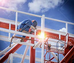 Workers welding