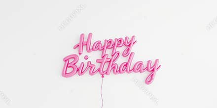 Celebratory pink balloon sign wishing happy birthday in a bright space