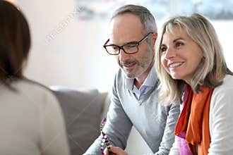 Senior couple meeting banker