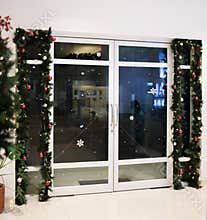 Chrismast decoration gate details with green leafy plants