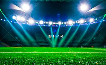 Modern Football Stadium with Dramatic Spotlighting at Night, Competition and Championship Concepts