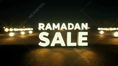 A sign for a Ramadan Sale is lit up in the dark