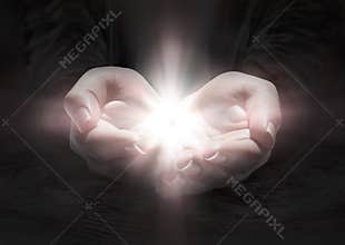 Light in hands - pray the crucifix