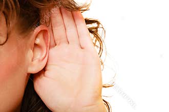Part of head woman with hand to ear listening