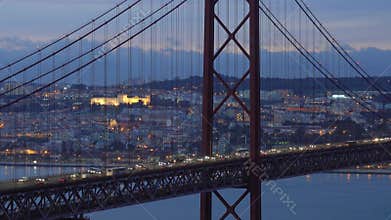 Bridge of 25th April with car traffic after sunset