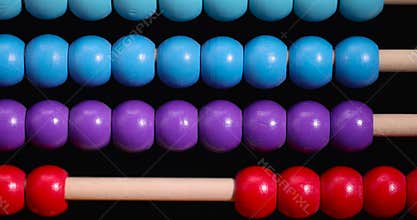 colorful wooden beads on abacus for children's play
