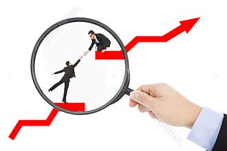 From magnifier , found business teamwork in stock market