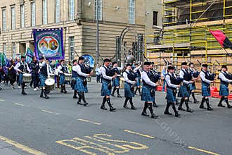 Marching Scottish Pipes and Drums Band
