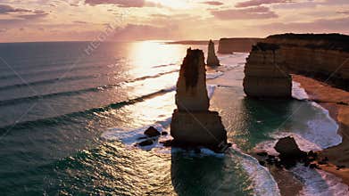 Twelve apostles rock formations at sunset along great ocean road, australia