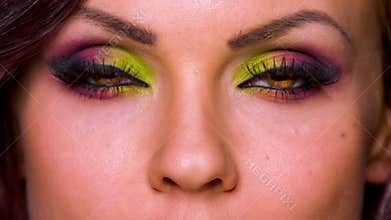 Close Up of Beautiful Female Model With Artistic Makeup