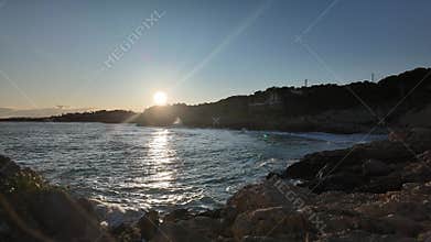 Sun setting on the catalan coast