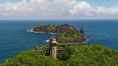 Lighthouse on a tropical island.